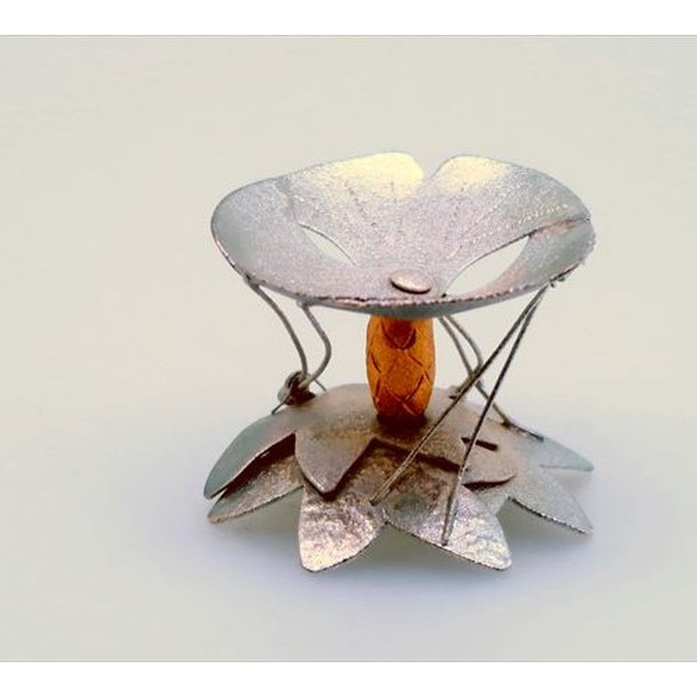 A Heian Shojudo bronze lid rest, cast in a sand mould