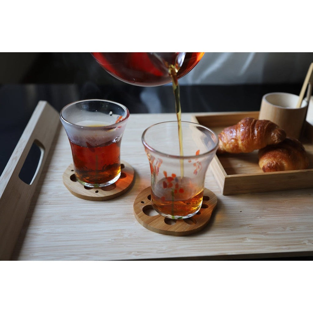 A Takano Chikko bamboo coaster